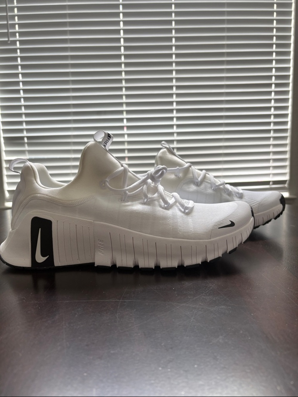 Nike White Athletic Sneakers with Black Accents